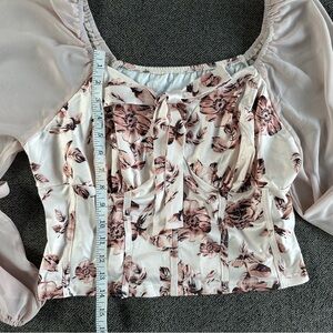 White blouse with square neck puff sleeves and fitted bustier style